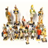 13 porcelain figures, mainly of 19th Century Continental soldiers, tallest H.23.5cm; and 9 Fontanini