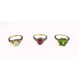 9ct gold ring set ruby and diamonds, 9ct ring set diamonds and lime green stone, and a 9ct ring