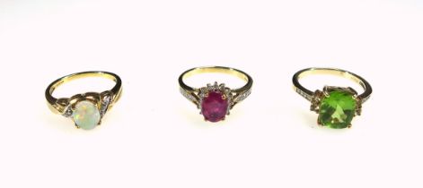 9ct gold ring set ruby and diamonds, 9ct ring set diamonds and lime green stone, and a 9ct ring