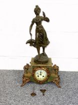 Late 19th Century French spelter and onyx mantel clock with a circular enamelled dial enclosing an 8