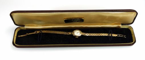 Vertex Revue ladies 9ct gold bracelet watch with a circular dial enclosing a Swiss side-wind
