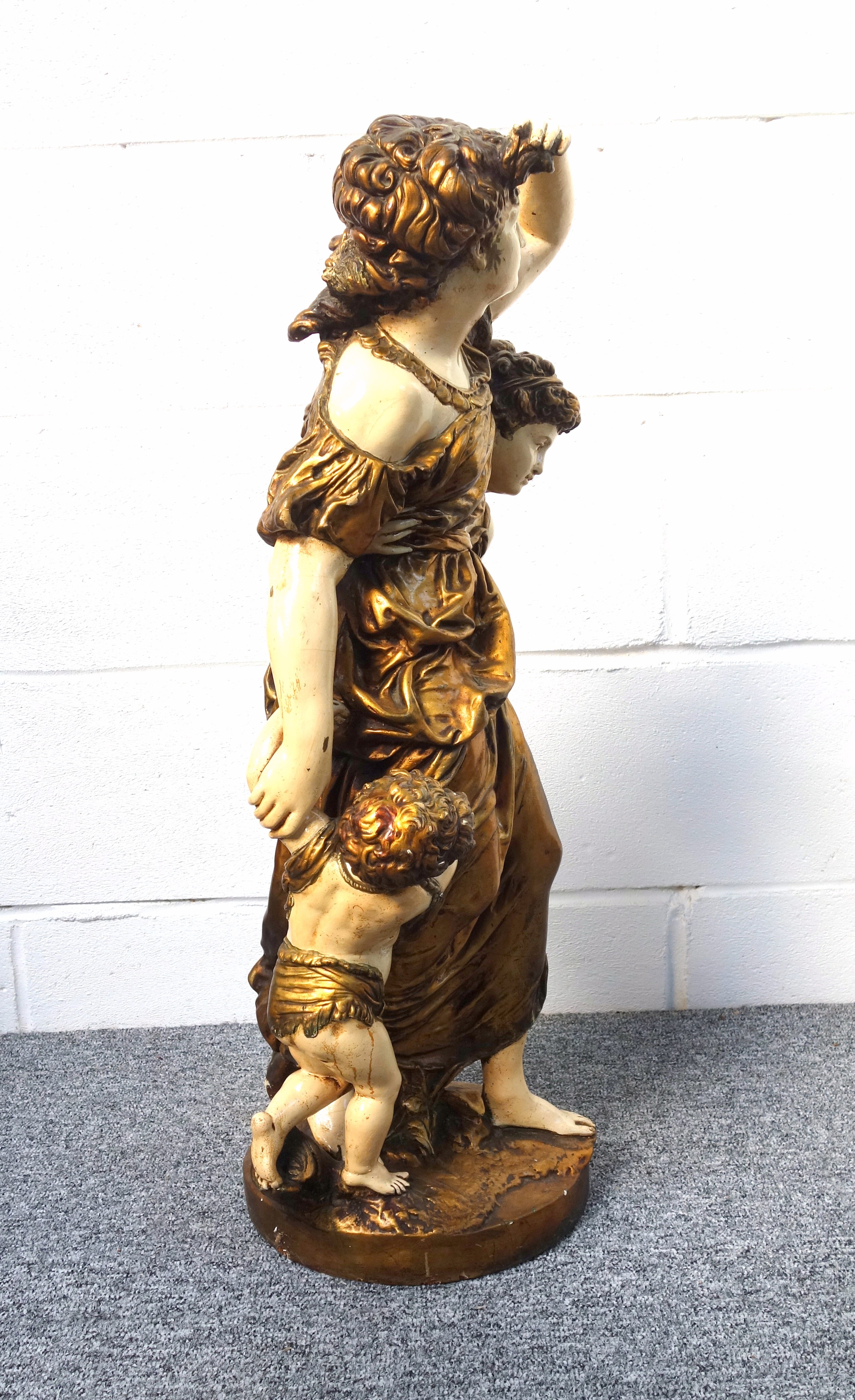 Late 19th Century Austrian plaster group of a woman with two children wearing gold costume, standing - Image 2 of 5