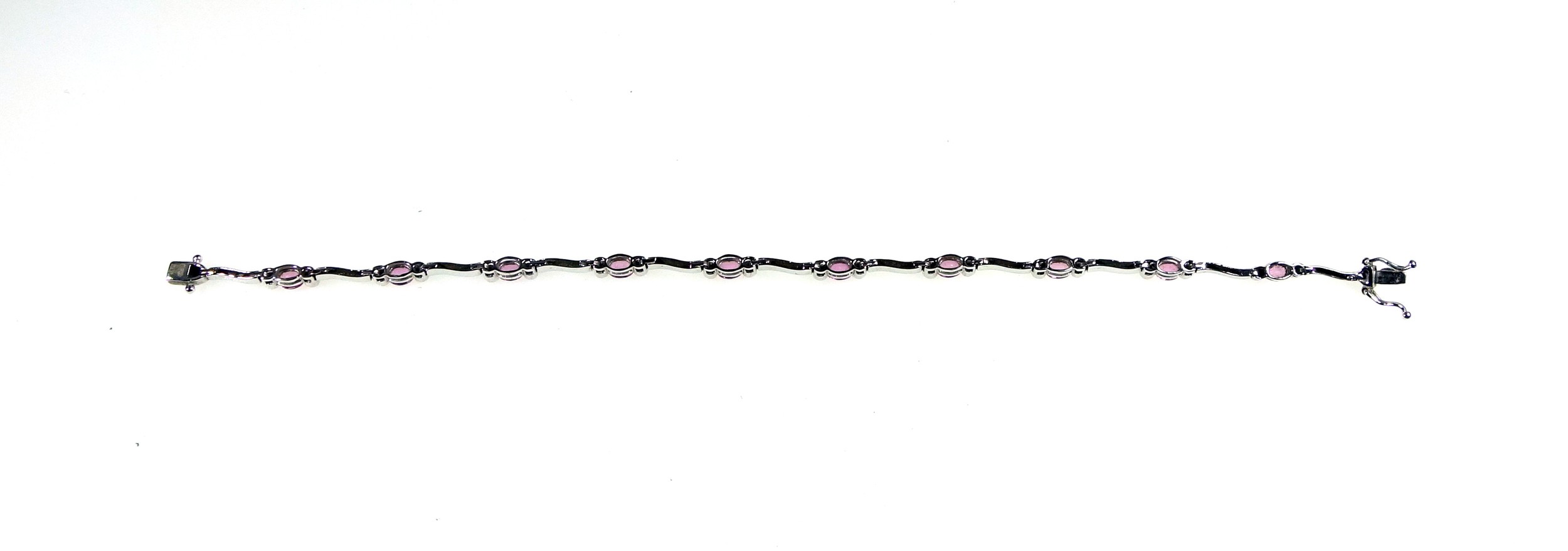 18ct white gold bracelet set with 20 brilliants and pale pink stones, L.18.5cm, gross 7.7grs, cased. - Image 3 of 4