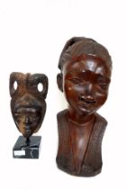 African wooden sculpture of a female bust, 42cm high x approx 29cm deep, an African mask raised on a