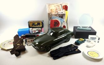 MG car related items to include a Dartmouth pottery green ceramic MG BGT, 38cm, owners club