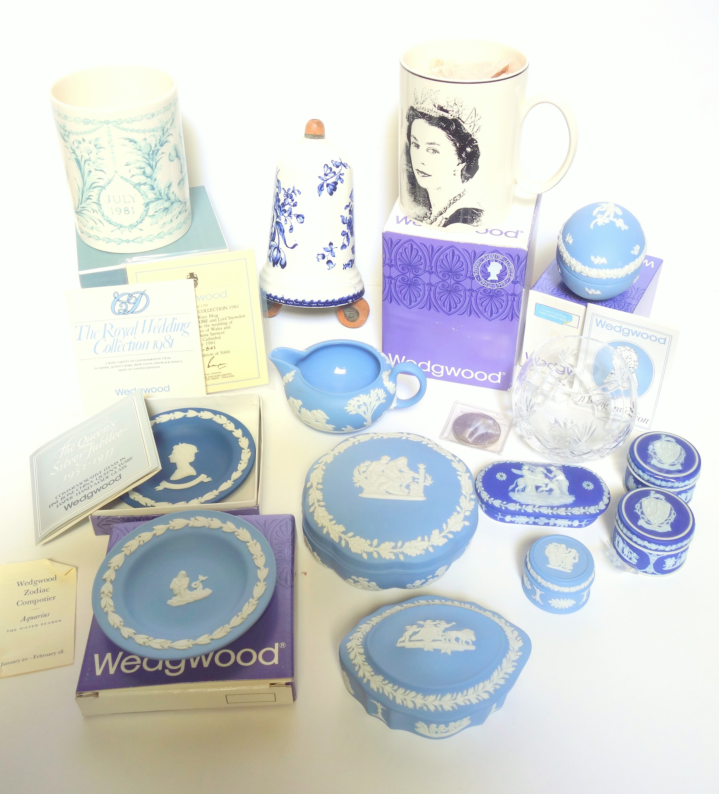 Wedgwood pale blue jasperware including an egg shaped trinket box, 'Aquarius' pin tray, cream jug