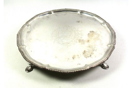 George III silver salver centred by a coat of arms and scrolling foliate decoration, with a - Image 1 of 5