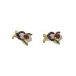 A pair of 18-kt gold earclips set with ruby, approx 0,35 ct.