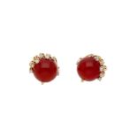 A pair of 18-kt earrings set with a carnelian cabochon with a diameter of approx. 15.5 mm, and brill