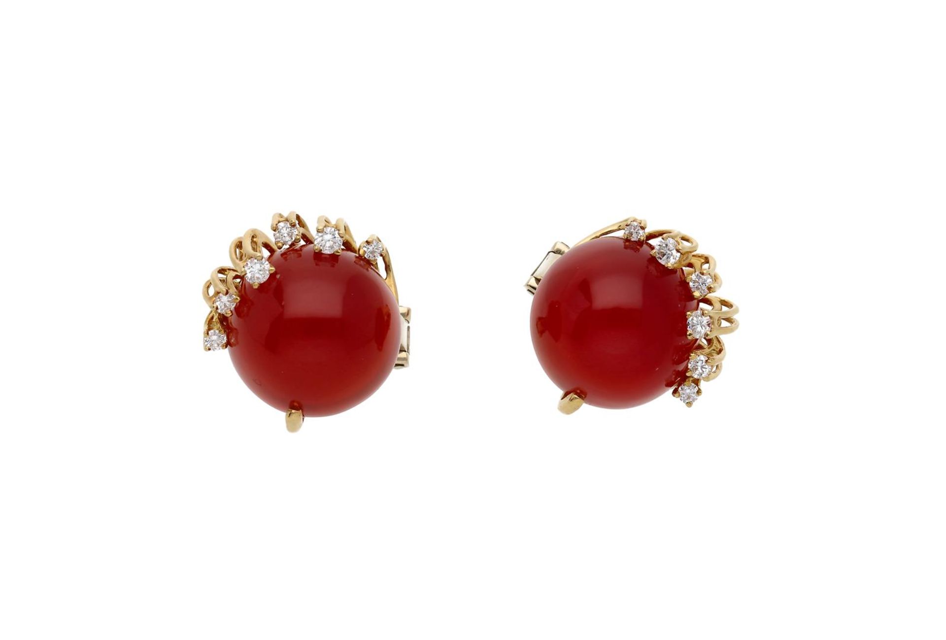 A pair of 18-kt earrings set with a carnelian cabochon with a diameter of approx. 15.5 mm, and brill