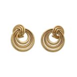 Cartier, a pair of 18-kt gold earrings, stamped Cartier, 1993 and No. C79672. D: 3,5 cm. Total weigh