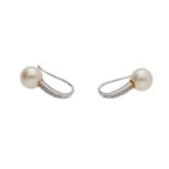 A pair of 18-kt white gold and cultured pearl earrings, set with brilliant cut diamonds, in total ap