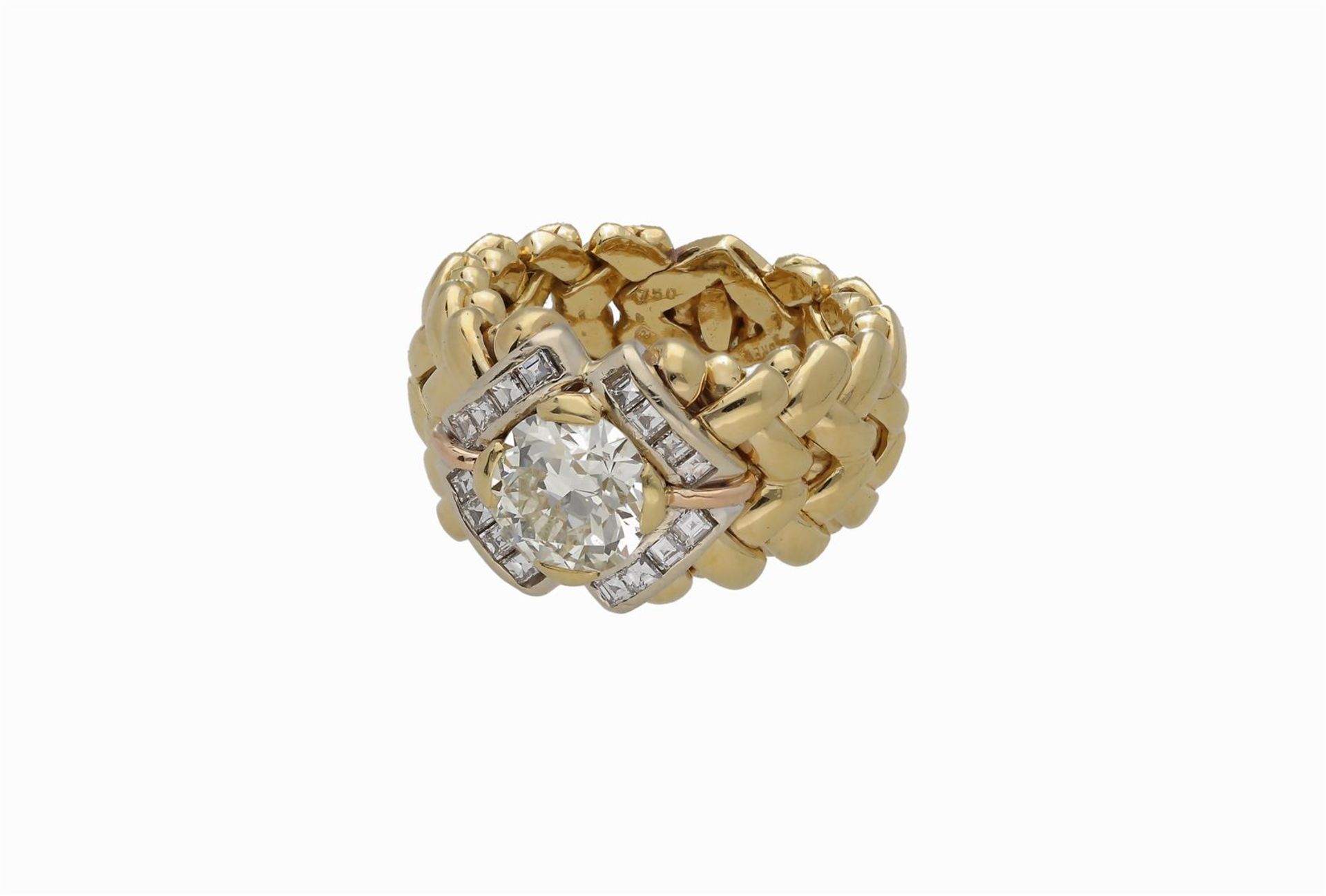 A 18-kt gold Cuban link ring, makers mark, Brev. 24PD, Vittorio Cesca, set with a european transitio