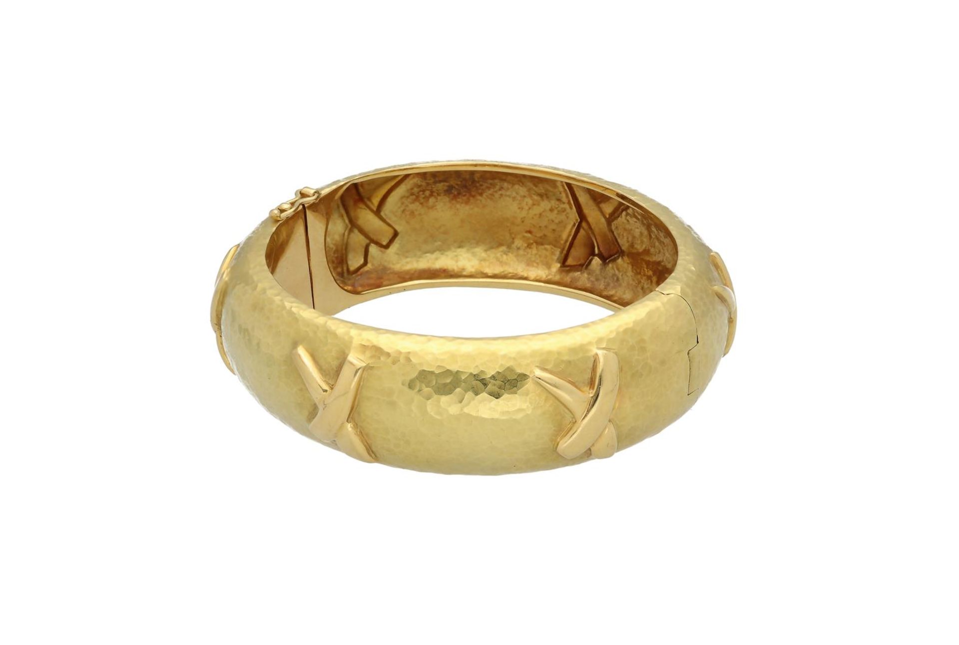 Tiffany & co., an 18-kt gold 'Graffiti' bangle, designed by Paloma Picasso, 1991. The hinged bangle - Image 2 of 2