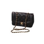 Chanel, a black quilted leather handbag, 'Classic Flap Bag', authenticity card no. 3965073, in box,