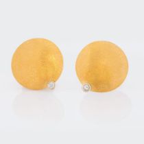 A Pair of Gold Earrings with small Diamonds.