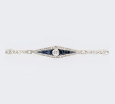 An Art-Nouveau Sapphire Diamond Brooch.