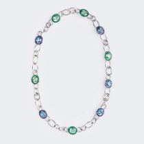 Wilm, Juwelier. An extraordinary Jewellery Set with Emeralds, Sapphires, Blue Topaz and Tourmalines.