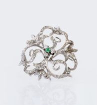 A Diamond Flower Brooch with Emerald.