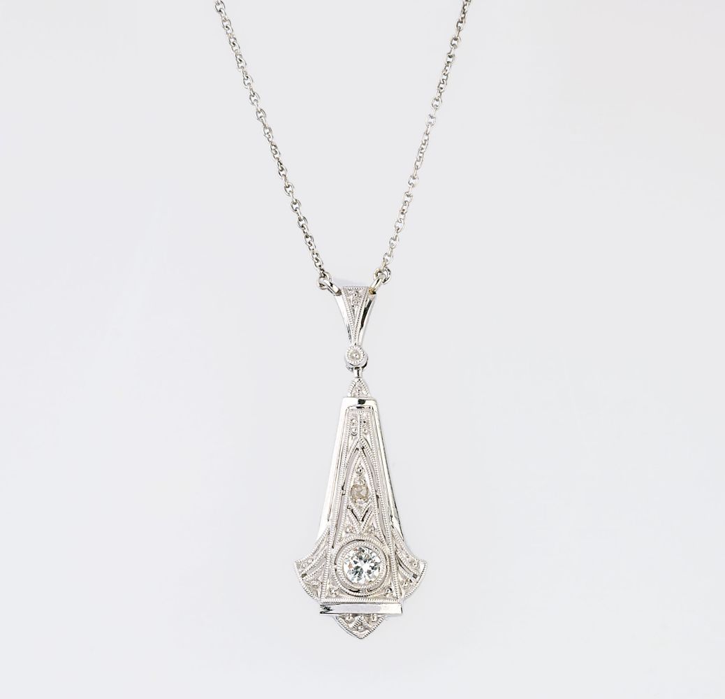 An Art-Nouveau Solitaire Diamond Pendant on Necklace.