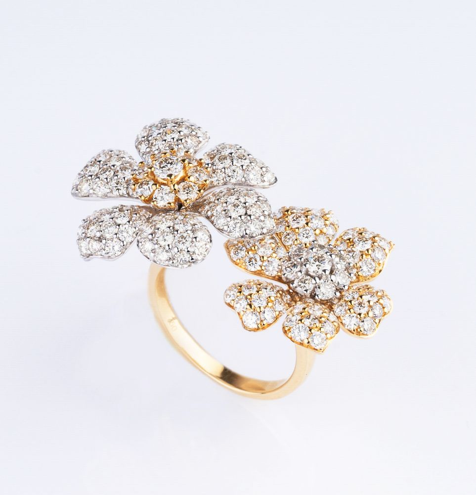 A bicolour Diamond Flower Ring.