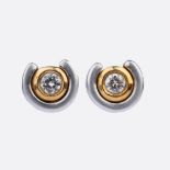 A Pair of small Solitaire Diamond Earstuds.
