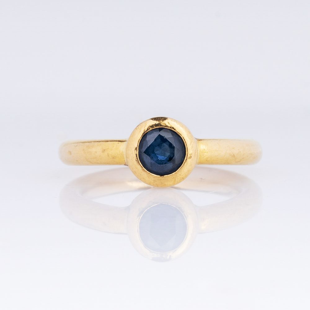 A Sapphire Ring.