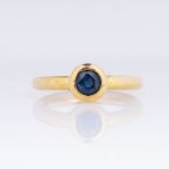 A Sapphire Ring.