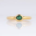 An Emerald Ring.