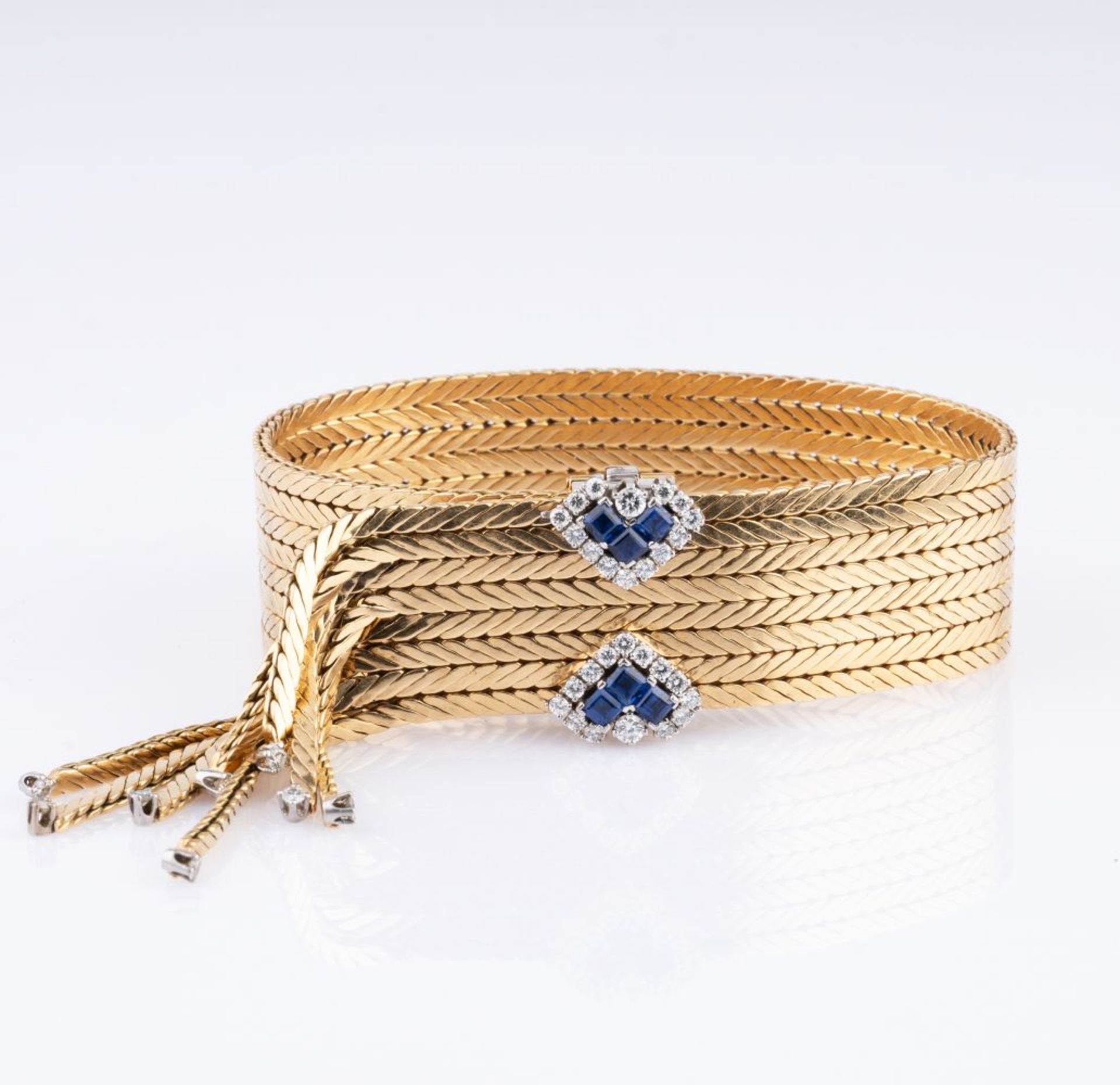 A rare Vintage Gold Bracelet with Sapphire Diamond Clasp.