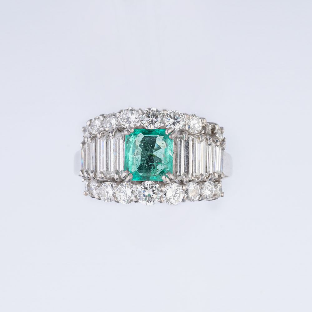 A very fine Emerald Diamond Ring.