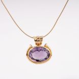 An Amethyst Pendant on Gold Necklace.