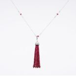 A Ruby Diamond Tassel Pendant on long Necklace in Art-déco Style.
