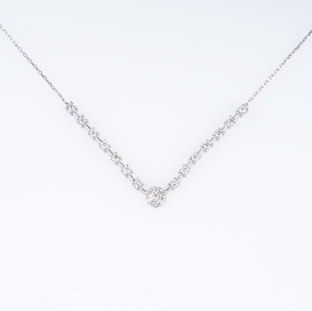 A petite Diamond Necklace.