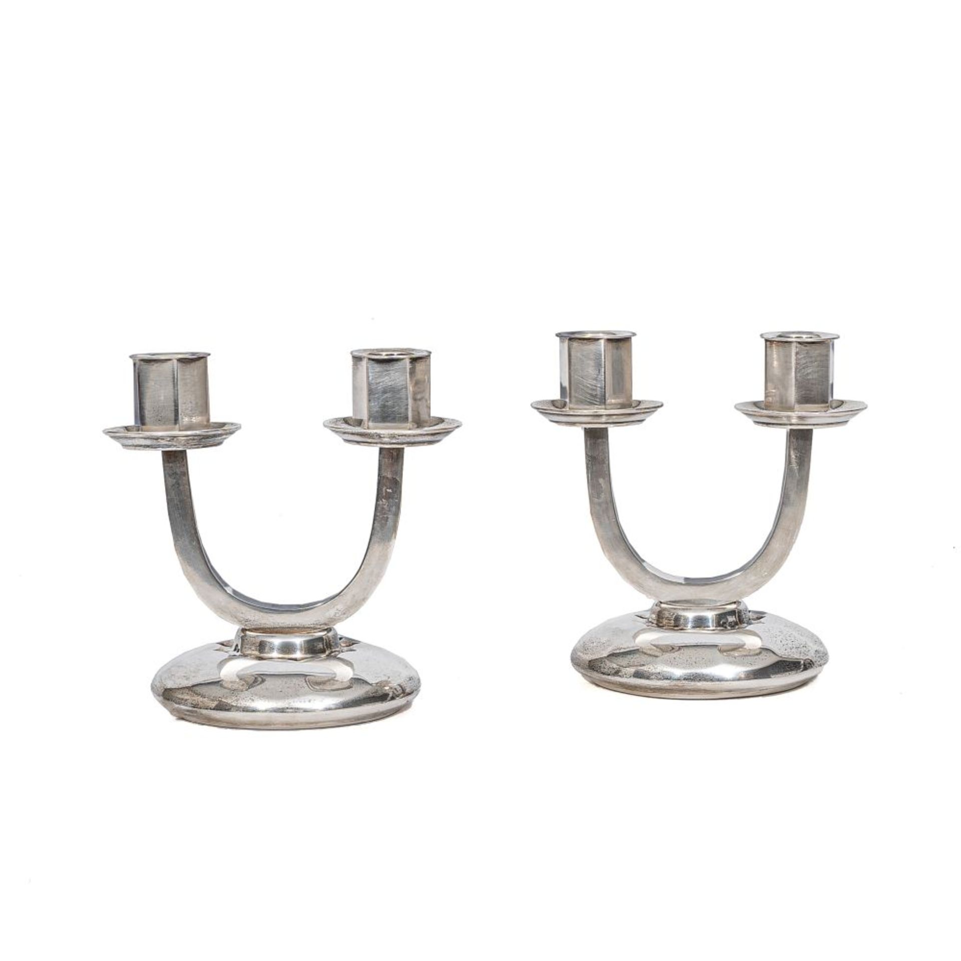 A Pair of Art Deco Candlesticks.