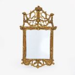 A Louis XVI Mirror.