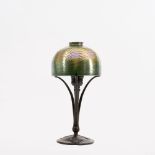 Tiffany, Louis Comfort (New York 1848 - 1933), Tiffany studios. A Table Lamp with Favrile Shade.