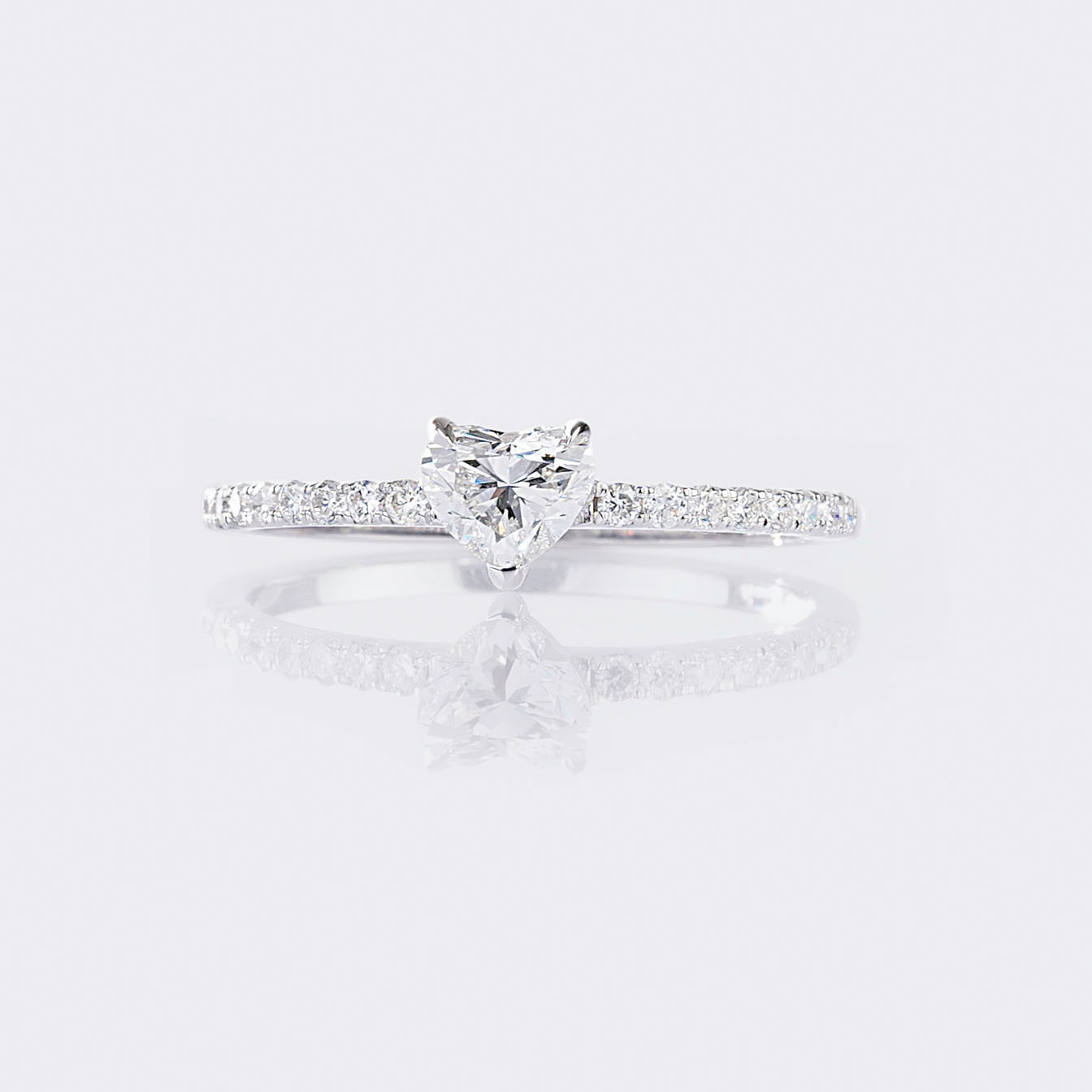 A Solitaire Heart Diamnd Ring with Diamonds.