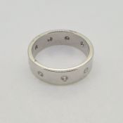 White gold wide band ring with interspersed diamonds Ring size O1/2 18ct