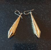 ***TO BE SOLD WITHOUT RESERVE*** A pair of gold plated long drop earrings with a pattern to the