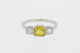 Platinum yellow sapphire and diamond 3 stone ring. (Yellow sapphire 1.40 carats, diamond total 0.