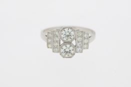 Platinum art deco style diamond dress ring. Estimated overall weight 0.90 carats.