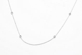 A round brilliant diamond set chain with 10 diamonds. Chain length approx 19inches. Estimated