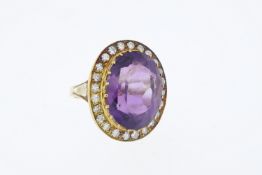18ct Yellow Gold Vintage oval amethyst and diamond cluster ring.