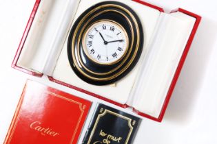 Cartier mechanical desk/bedside alarm clock. Approx 83.5x99mm Comes with Cartier box and undated