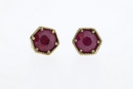 A pair of 9ct ruby stud earrings