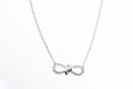 An 18ct diamond bow necklace.