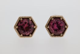 A pair of 9ct pink tourmaline stud earrings.