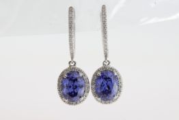 A pair of 18ct white gold tanzanite drop earrings.