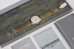 LONGINES QUARTZ WRISTWATCH BOX AND PAPERS 1993, Circular white dial with roman numeral hour markers,